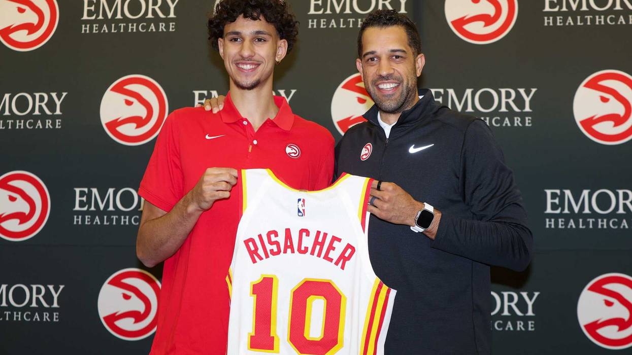 Atlanta Hawks first overall draft pick Zaccharie Risacher poses for a photo with general manager Landry Fields at the Emory Sports Medicine Complex.