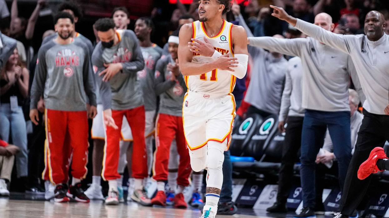 Atlanta Hawks guard Trae Young (11) reacts after making a three point shot against the Chicago Bulls during the second half at State Farm Arena.