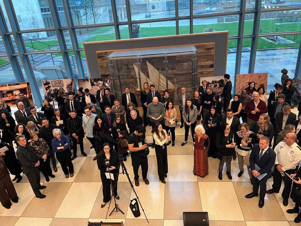 Attendees at the inauguration of the "Negative Positive" art exhibition at the United Nations on April 2, 2024.