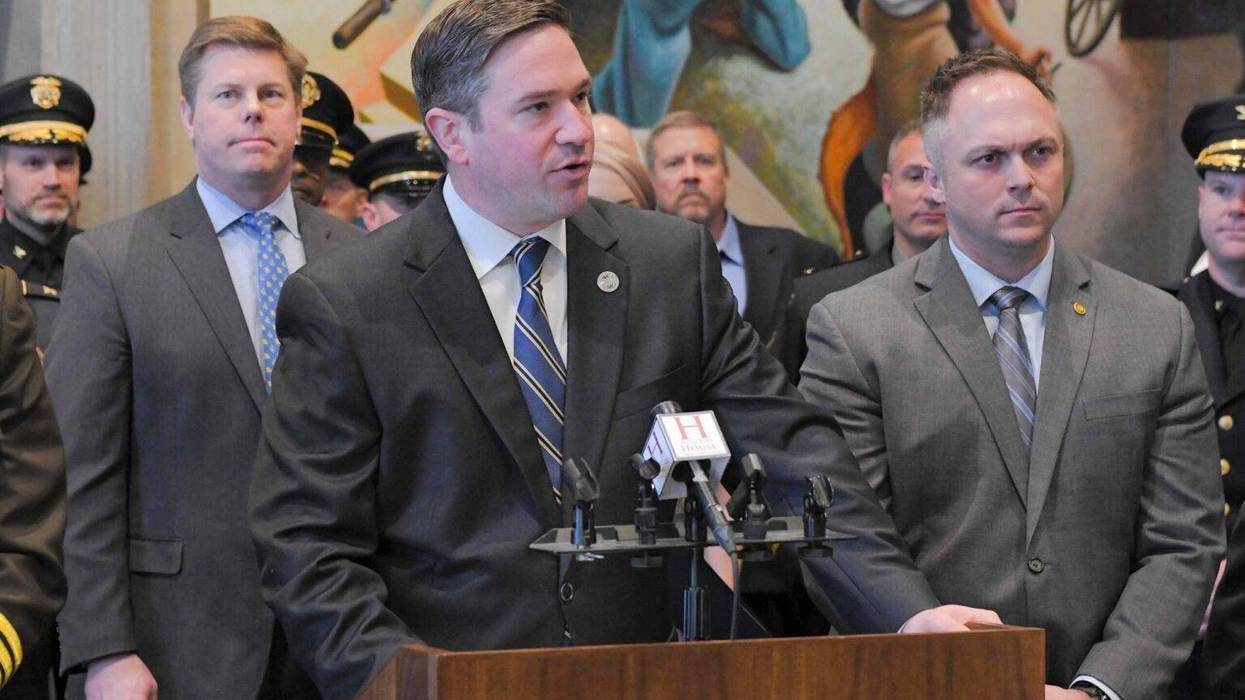 Attorney General Andrew Bailey speaks during a 2024 news conference in the Missouri House Lounge, flanked by House Speaker Dean Plocher, left, and state Rep. Justin Sparks.