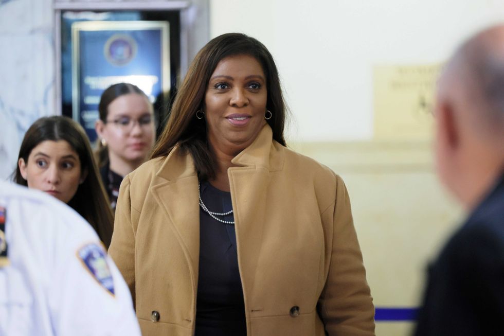 Attorney General Letitia James exits the courtroom for a lunch recess during Donald Trump