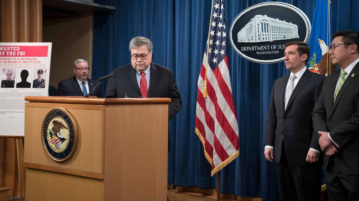 Attorney General William Barr arrives to a press conference at the Department of Justice along with DOJ officials on February 10, 2020 in Washington, DC.
