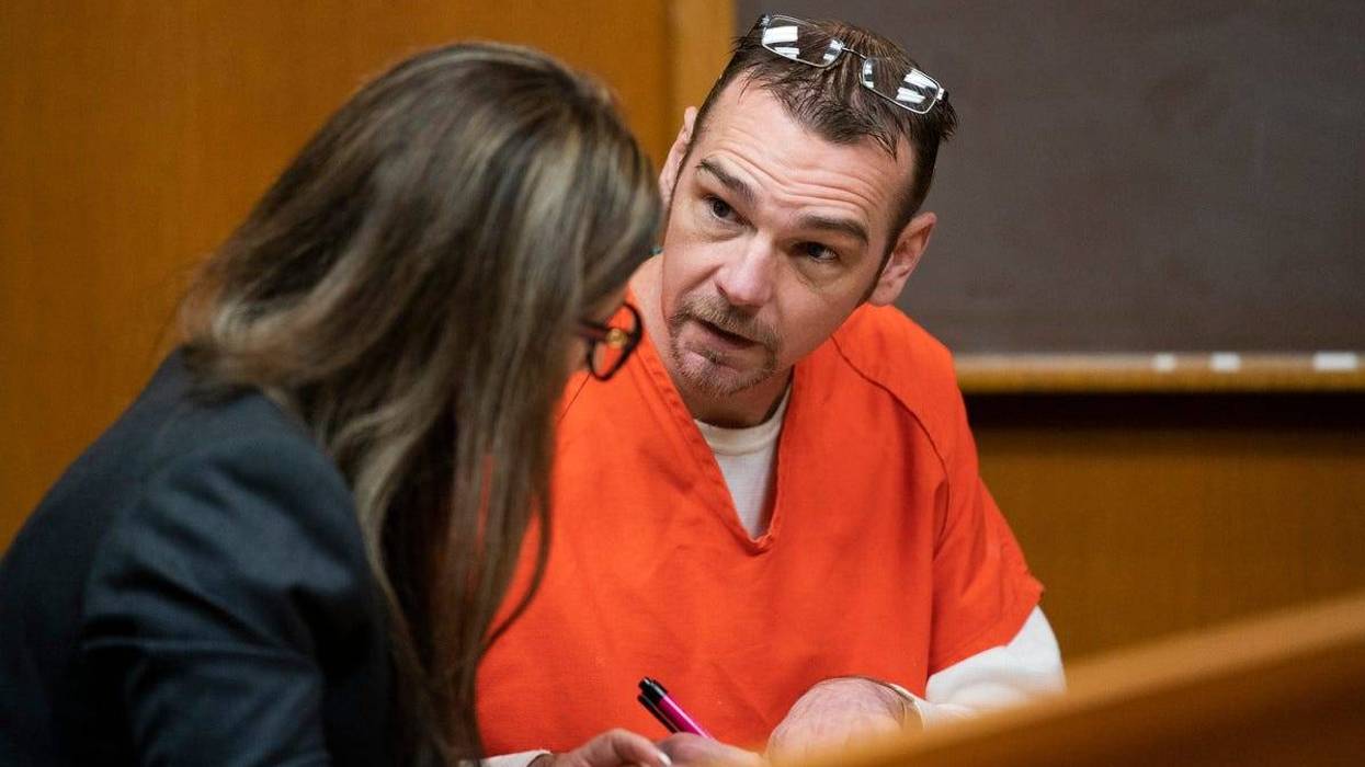 Attorney Mariell Lehman, left, speaks to her client James Crumbley