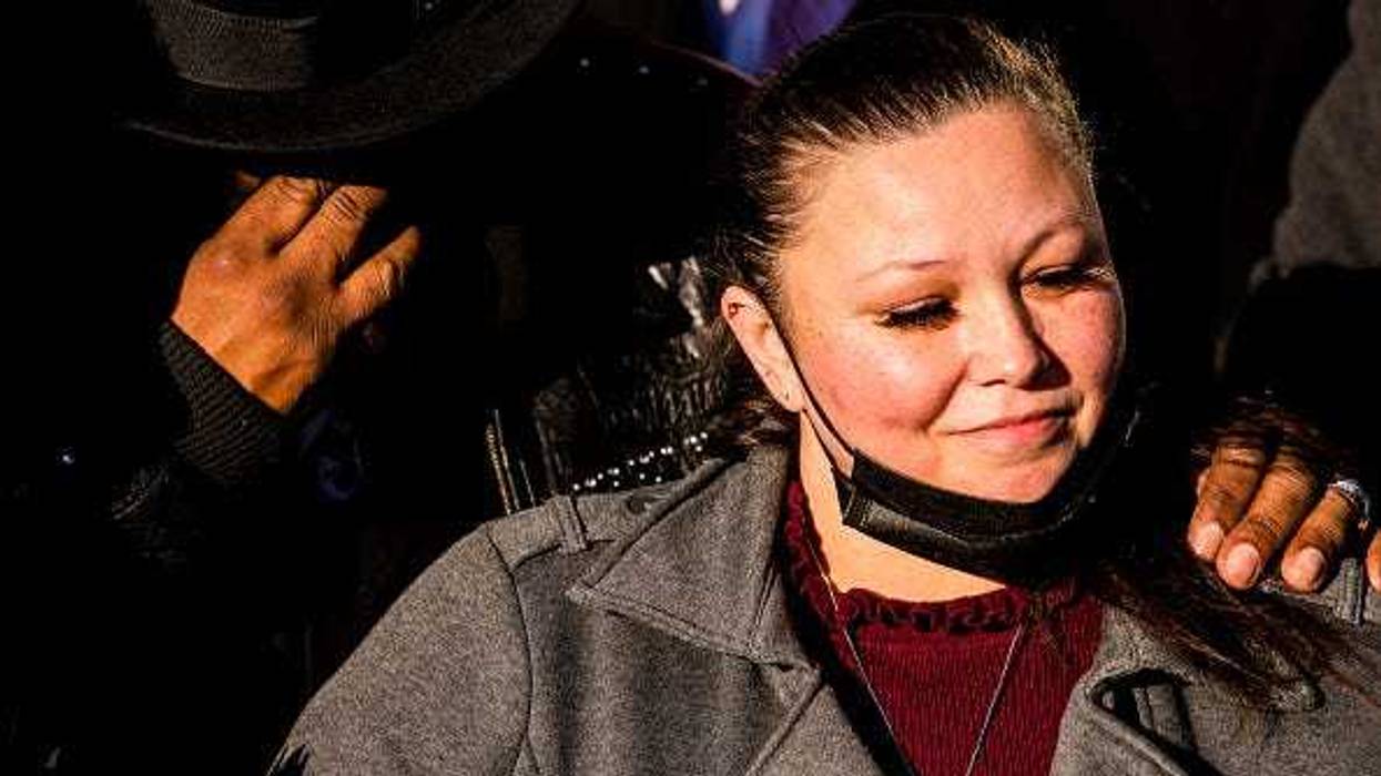 Aubrey Wright (L) and Katie Wright (R), parents of Daunte Wright, join friends and family outside the Hennepin County Courthouse after the verdict was read in the trial of Kim Potter on December 23, 2021 in Minneapolis, Minnesota