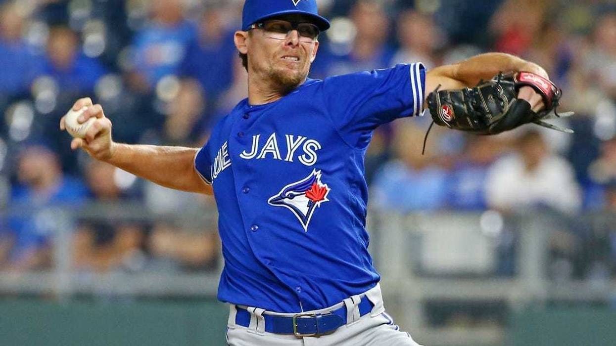Aug 14, 2018; Kansas City, MO, USA; Toronto Blue Jays relief pitcher Tyler Clippard (36) pitches against the Kansas City Royals in the eighth inning at Kauffman Stadium. Mandatory Credit: Jay Biggerstaff-USA TODAY Sports