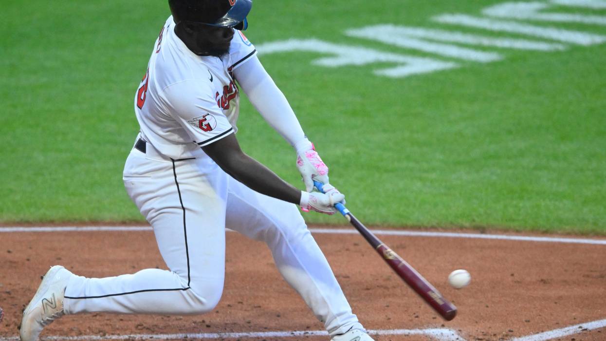 Aug 14, 2024; Cleveland, Ohio, USA; Cleveland Guardians right fielder Jhonkensy Noel (43) hits a three-run home run in the fourth inning against the Chicago Cubs at Progressive Field.
