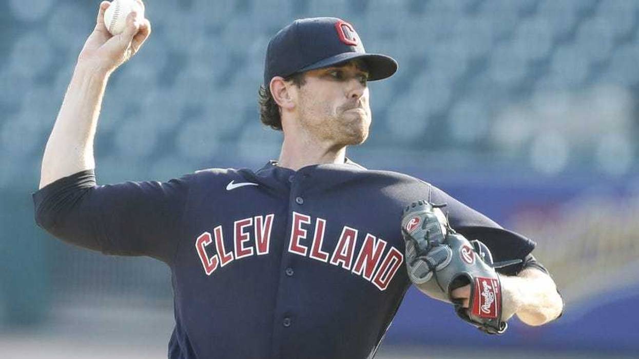 Aug 15, 2020; Detroit, Michigan, USA; Cleveland Indians starting pitcher Shane Bieber (57) pitches during the first inning against the Detroit Tigers at Comerica Park. Mandatory Credit: Raj Mehta-USA TODAY Sports