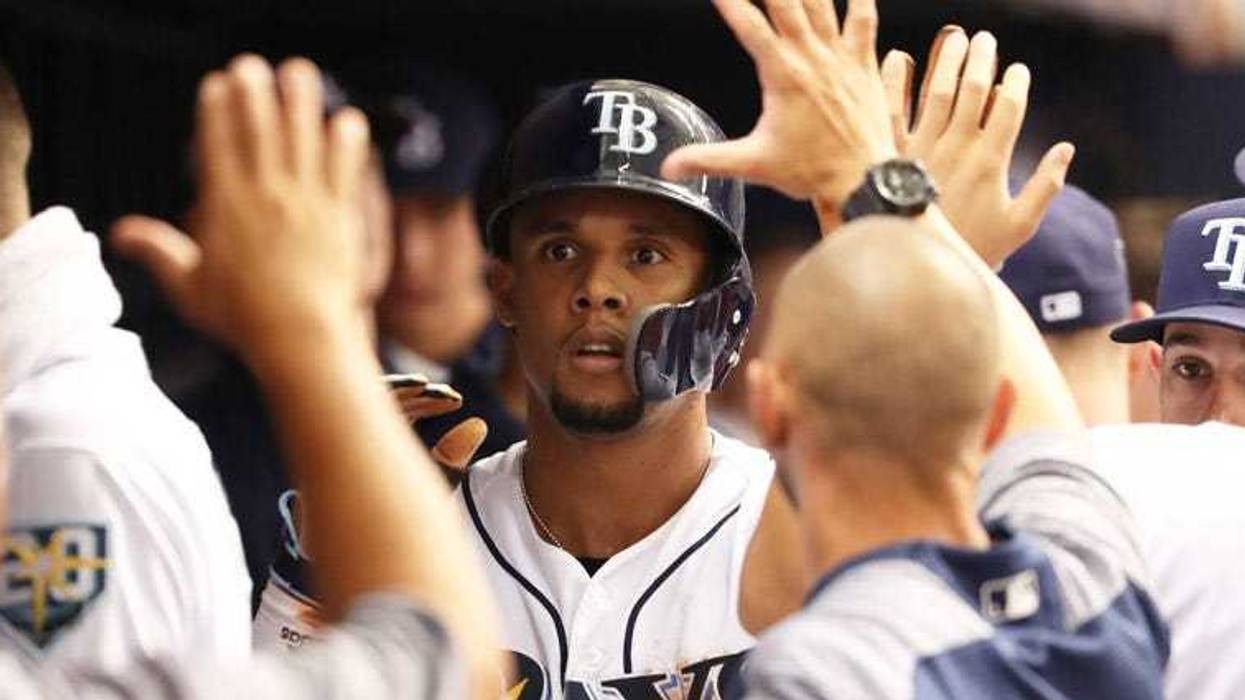 Aug 22, 2018; St. Petersburg, FL, USA; Tampa Bay Rays right fielder Carlos Gomez (27) doubles during the second inning against the Kansas City Royals at Tropicana Field. Mandatory Credit: Kim Klement-USA TODAY Sports