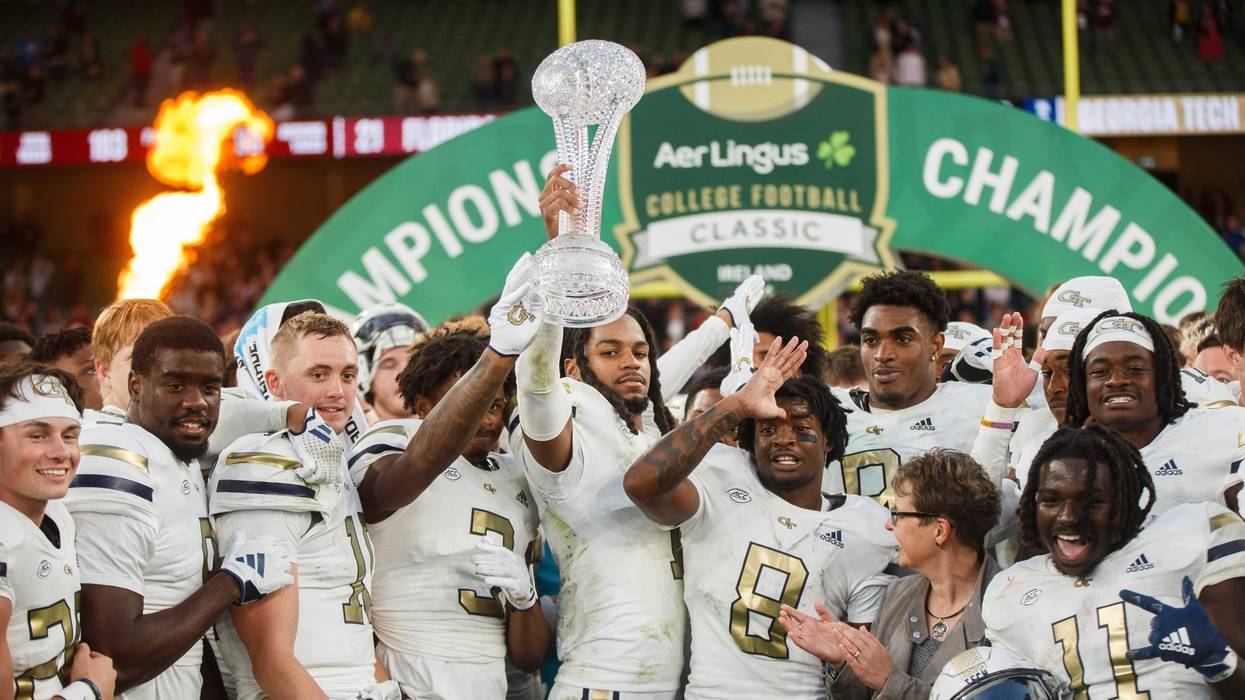 Aug 24, 2024; Dublin, IRL; Georgia Tech celebrate their win against Florida State at Aviva Stadium. Mandatory Credit: Tom Maher/INPHO via USA TODAY Sports