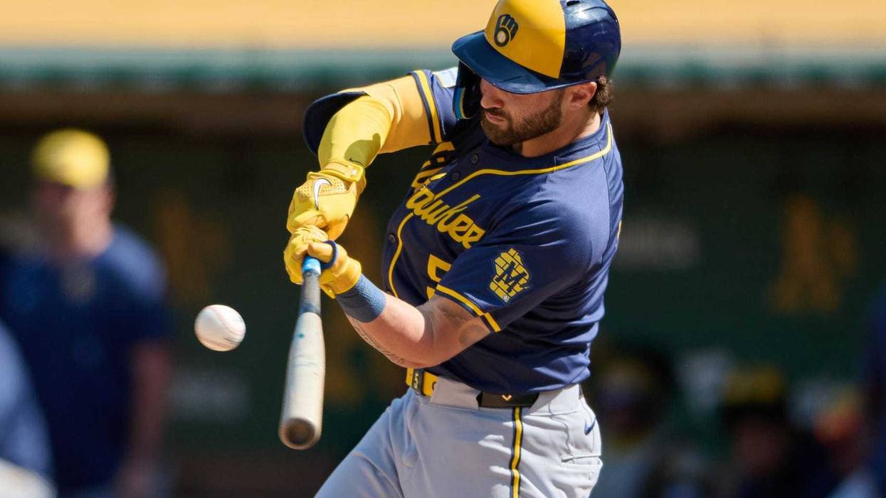 Aug 24, 2024; Oakland, California, USA; Milwaukee Brewers outfielder Garrett Mitchell (5) bats against the Oakland Athletics during the ninth inning at Oakland-Alameda County Coliseum. Mandatory Credit: Robert Edwards-USA TODAY Sports
