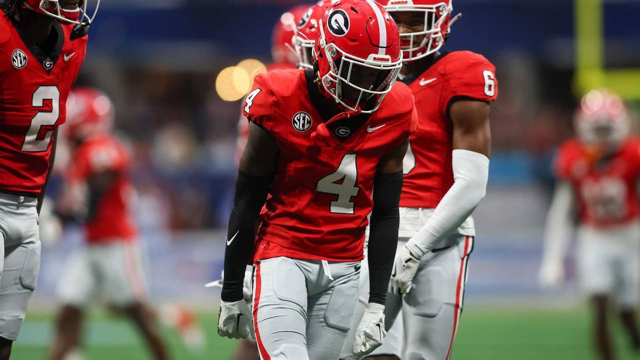 Aug 31, 2024; Atlanta, Georgia, USA; Georgia Bulldogs defensive back KJ Bolden (4) reacts after a tackle against the Clemson Tigers in the first quarter at Mercedes-Benz Stadium. Mandatory Credit: Brett Davis-Imagn Images