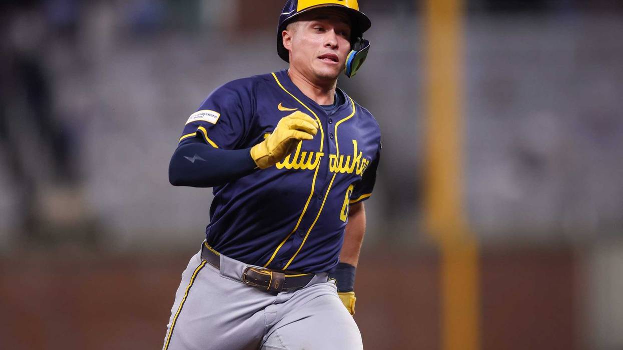 Aug 5, 2025; Atlanta, Georgia, USA; Milwaukee Brewers right fielder Isaac Collins (6) runs to third on a triple against the Atlanta Braves in the sixth inning at Truist Park. Mandatory Credit: Brett Davis-Imagn Images