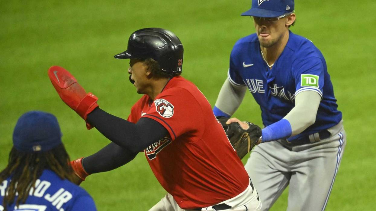 Aug 7, 2023; Cleveland, Ohio, USA; Toronto Blue Jays second baseman Cavan Biggio (8) tags Cleveland Guardians catcher Bo Naylor (23) to start an unassisted double play in the eighth inning at Progressive Field.