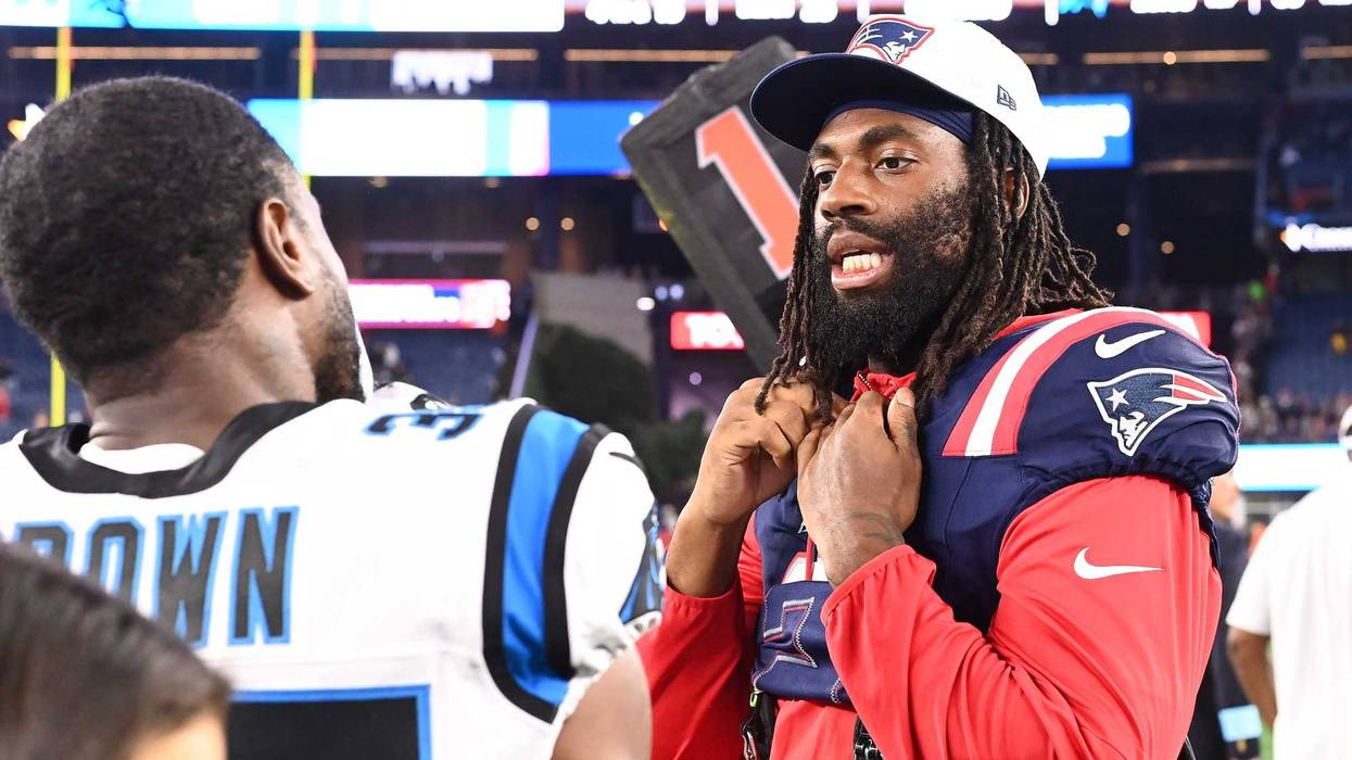 August 8, 2024; Foxborough, MA, USA; New England Patriots linebacker Matthew Judon (9) speaks to Carolina Panthers cornerback Anthony Brown (35) after a game at Gillette Stadium. Mandatory Credit: Eric Canha-USA TODAY Sports