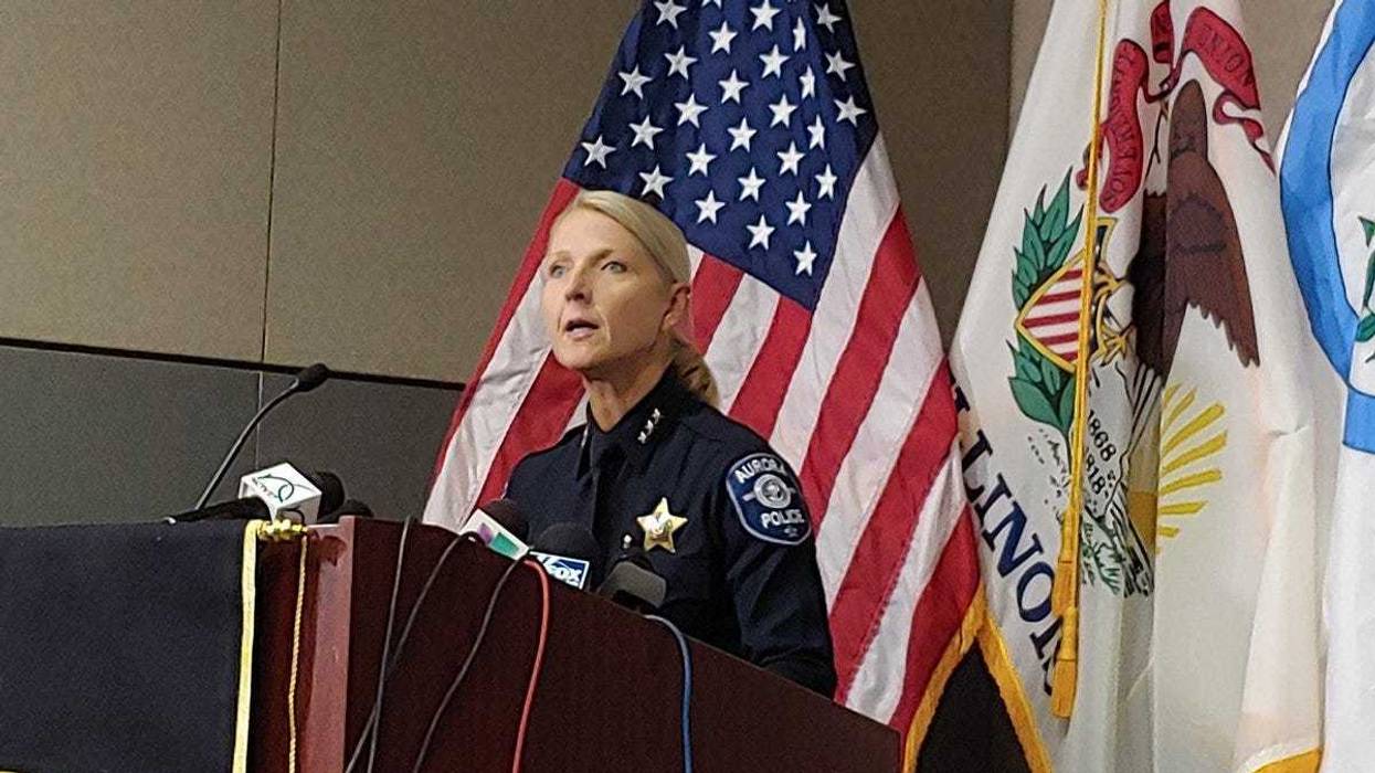Aurora police speaking at presser