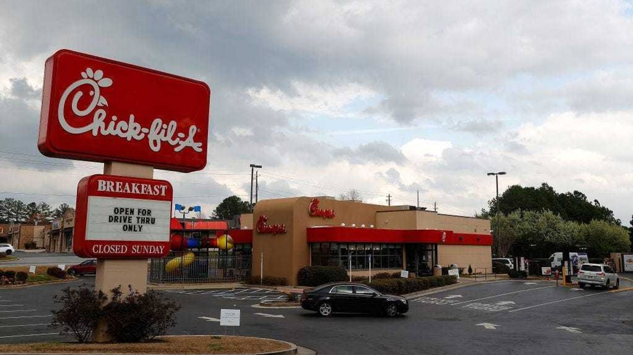 AUSTELL, GEORGIA - MARCH 18: A view of Chick-fil-A on Austell Road as customers pull around for their drive-thru orders on March 18, 2020 in Austell, Georgia. All locations across the country have temporarily closed their dining room seating to prevent th