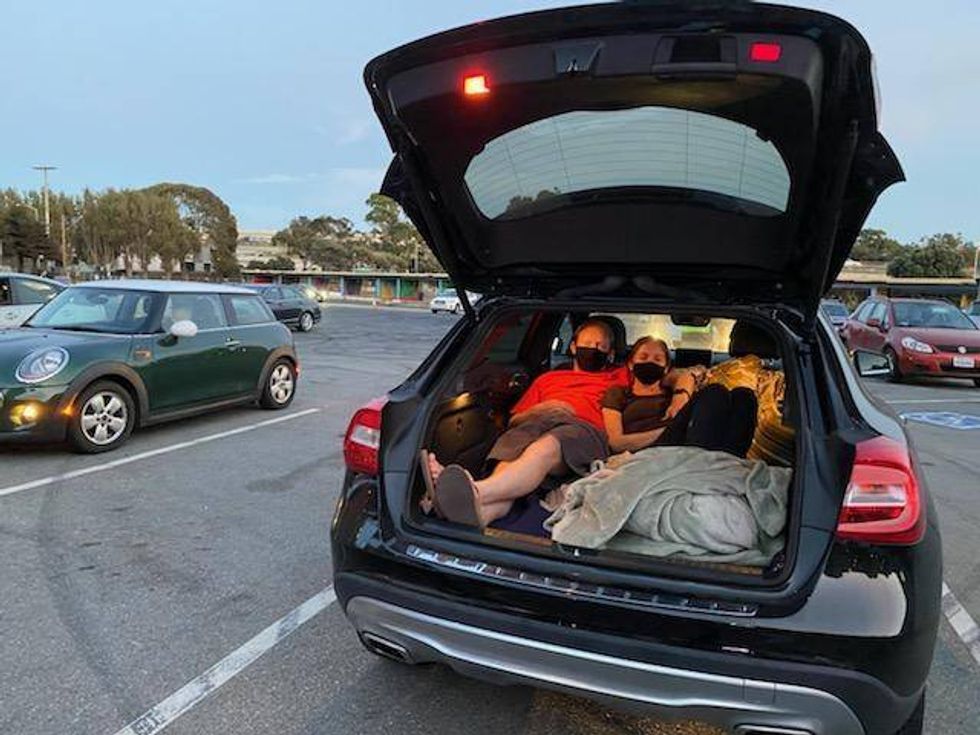 Austin and Nicole cozy up for the 17th annual Bernal Heights Outdoor Cinema Festival, which has transformed into a drive-in during the pandemic.