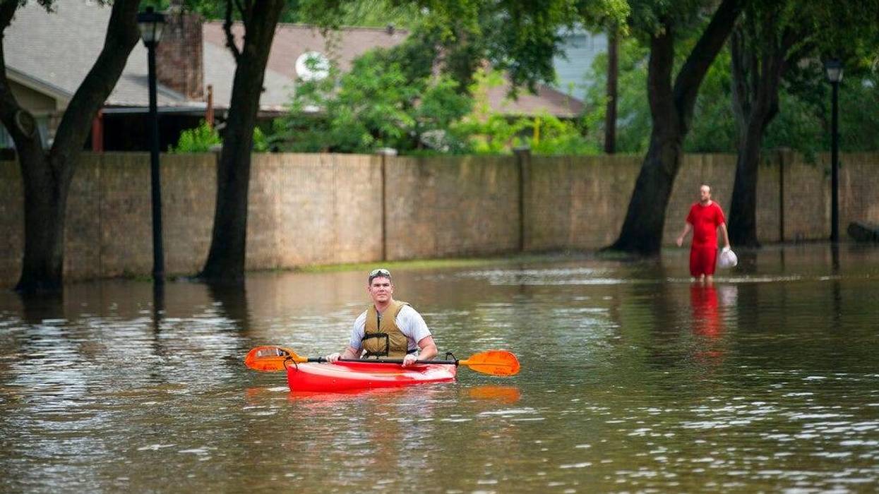 Austin Parkway and Sweetwater Blvd. in the Colony Bend neighborhood of Sugar Land, Texas, on Wednesday, May 8, 2019. Rowland bought the kayak shortly before Hurricane Harvey and was glad to have it, he said. Residents have been surprised that the water ha