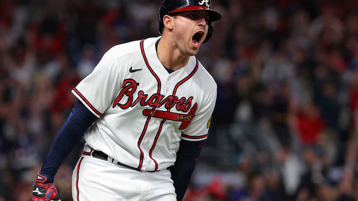 Austin Riley #27 of the Atlanta Braves rounds the bases after hitting a two-run home run in the eighth inning against the Philadelphia Phillies during Game Two of the Division Series