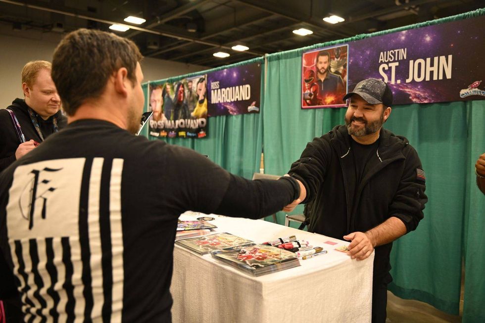 Austin St. John greeting a fan at GalaxyCon.