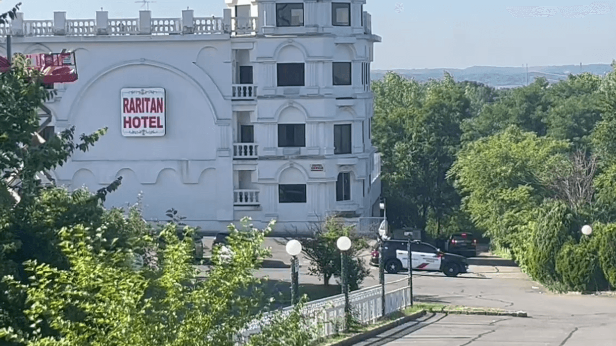 Authorities are investigating a police-involved shooting at the Raritan Hotel on Kings George Post Road in Woodbridge