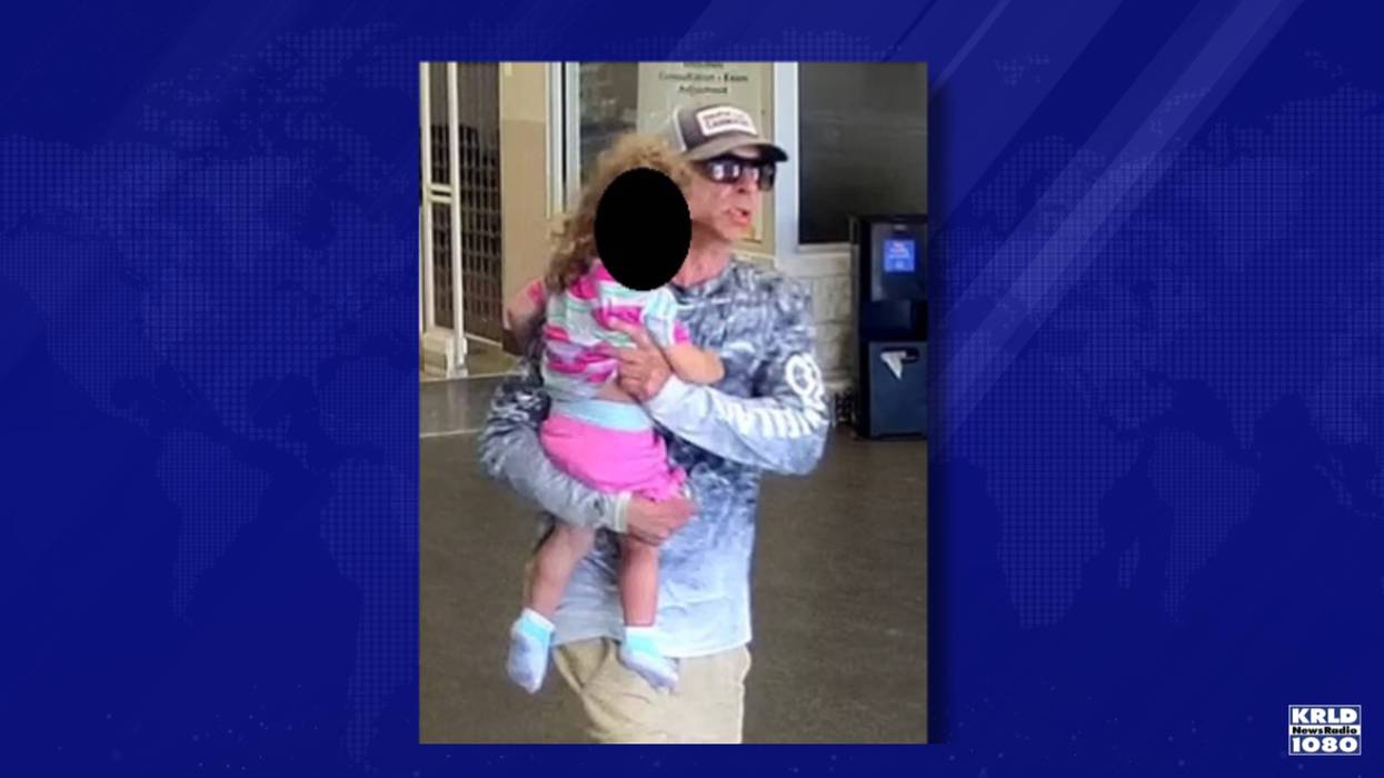 Authorities are searching for a man who robbed a Fort Worth bank with a child.