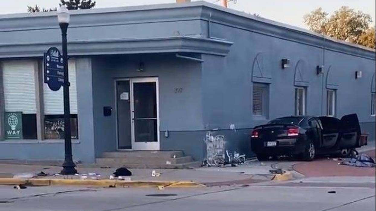 Authorities converged in western Wayne County early Friday morning after two people were shot and the suspect was reportedly arrested after a manhunt.
