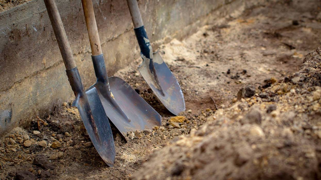 Authorities in Kent County confirmed the deaths of two men after a trench they were digging in western Michigan collapsed in on them.