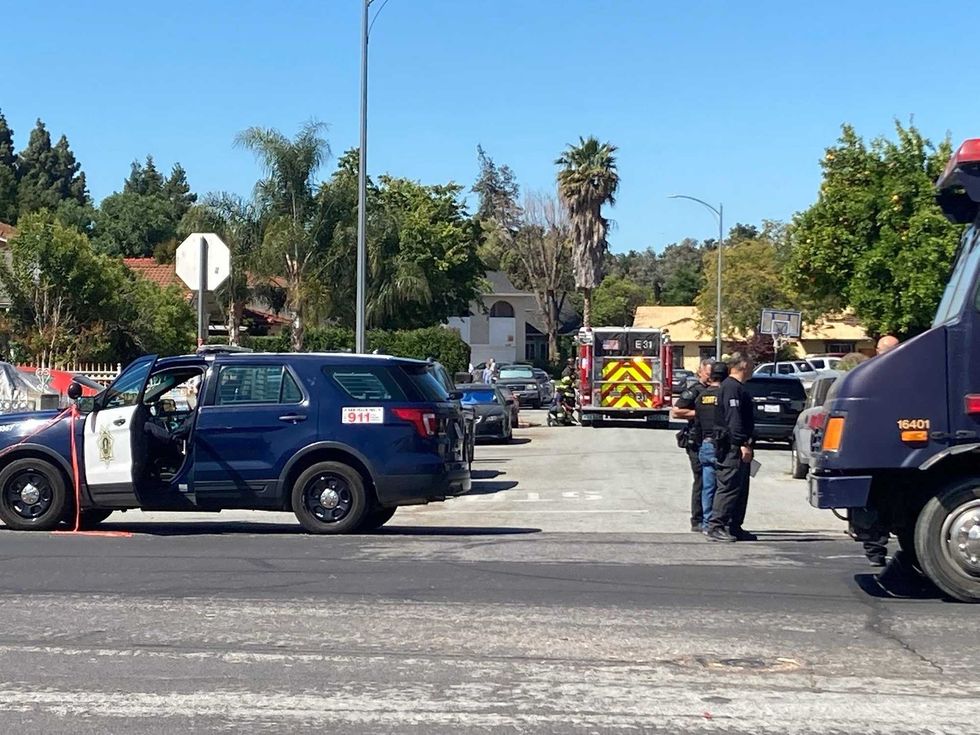 Authorities on the scene of a two-alarm house fire on Angmar Court in San Jose.