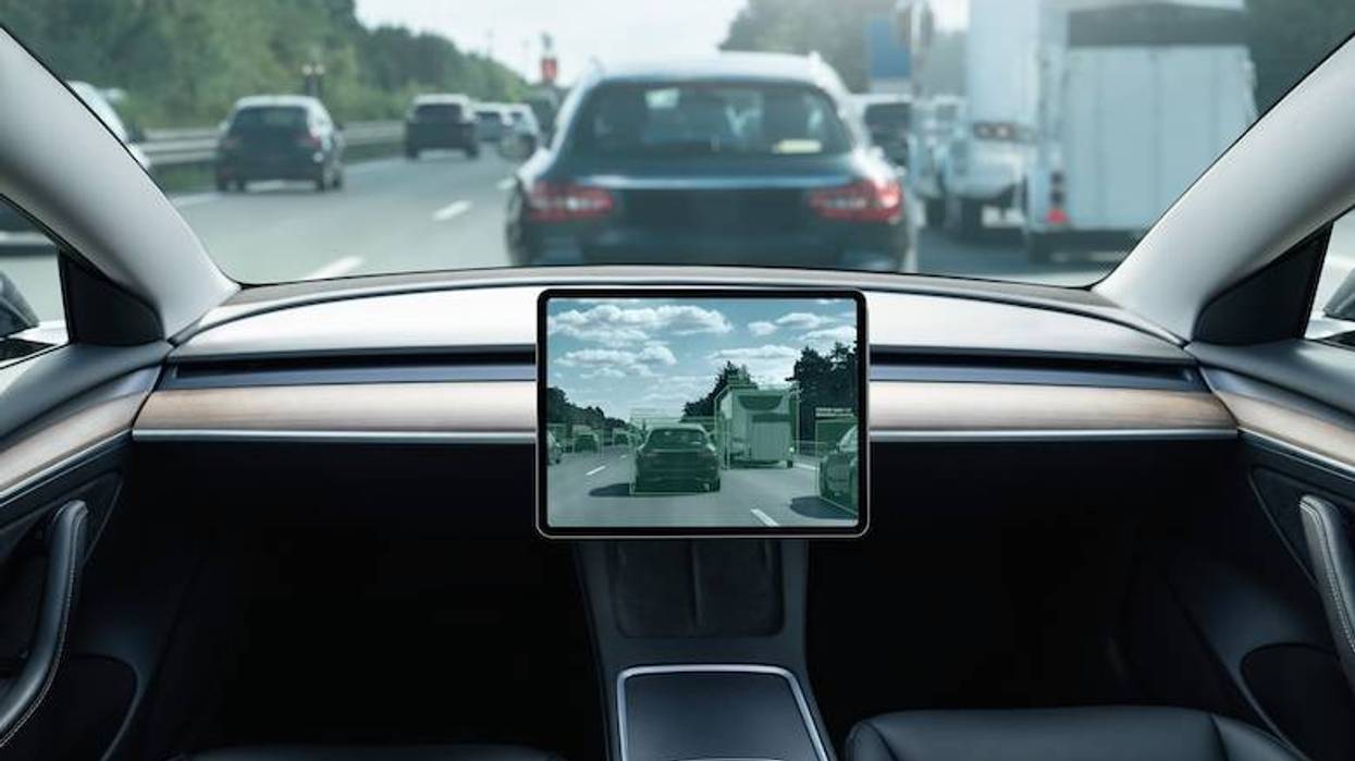Autonomous vehicle driving down the road