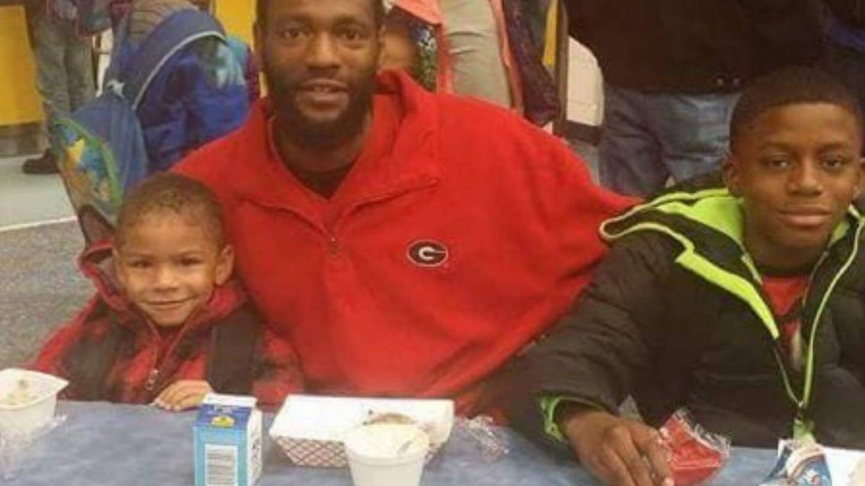 Autopsy indicates that 32 year old Antonio May (shown with 2 of his 3 sons) died of "excessive force" inside the Fulton County jail on September 11, 2018