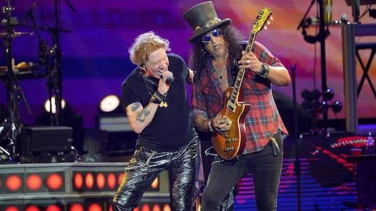 Axl Rose and Slash of Guns N' Roses performing on the Pyramid Stage at the Glastonbury Festival at Worthy Farm in Somerset