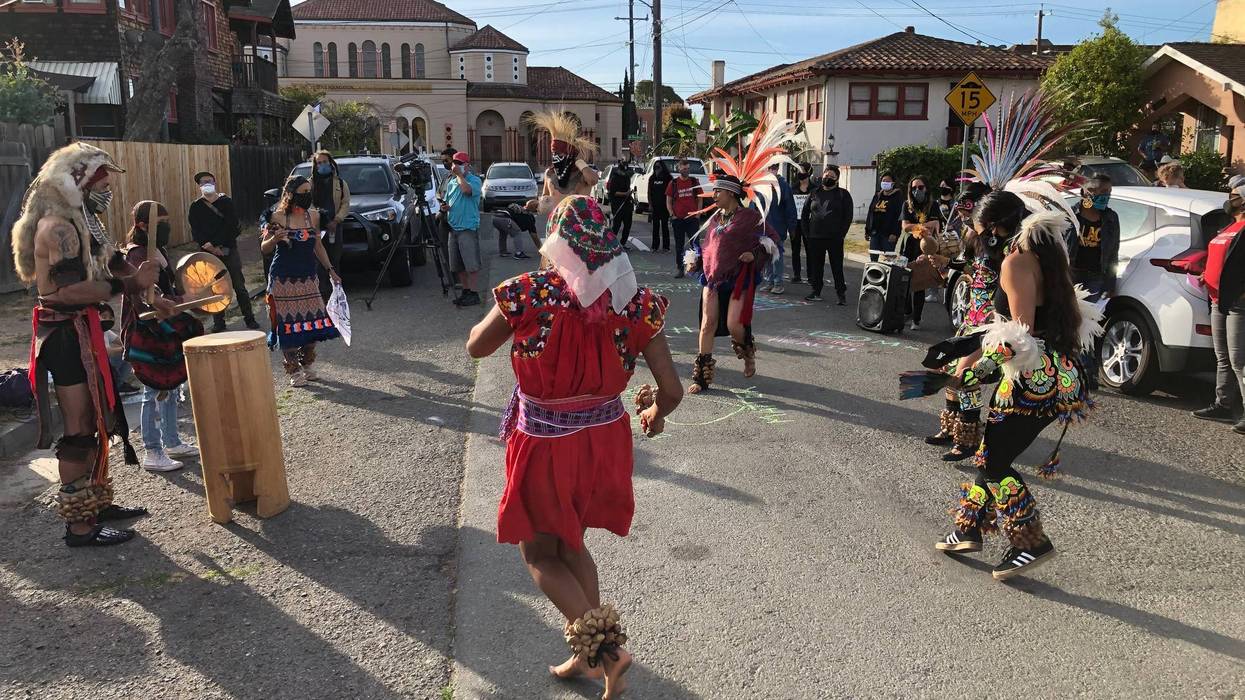 Aztec dancers, drummers delivered a "wake up" call to Oakland city leaders calling on them to defund the city's police department