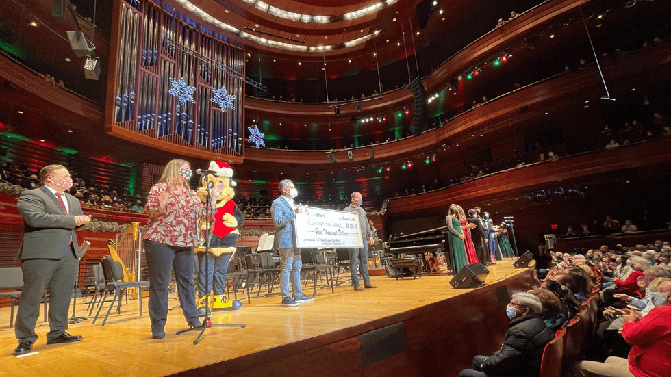 B101.1 presenting Neshaminy High School's Select Choir the $5,000 Grand Prize at The Kimmel Center