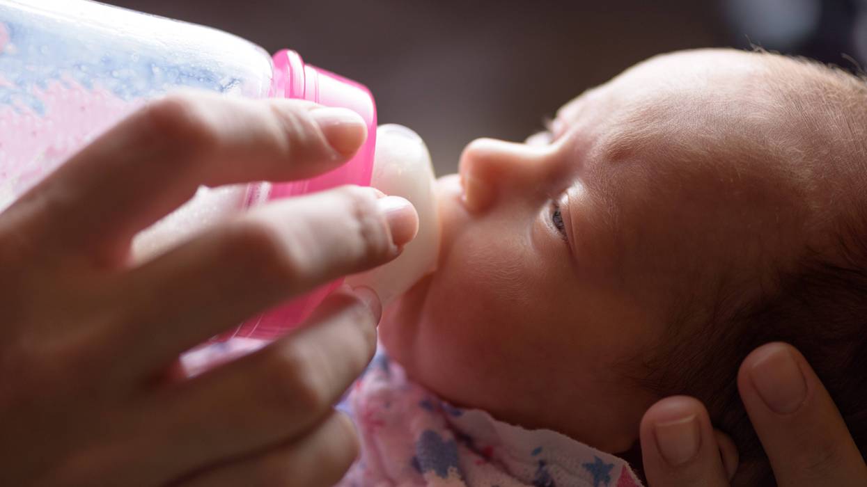 Baby drinking formula