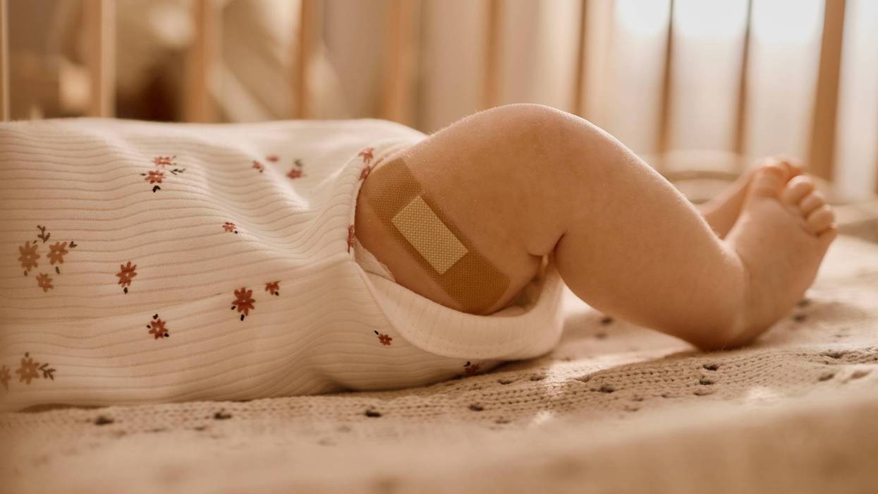 Baby Lying at Home with Bandage after Vaccination Care
