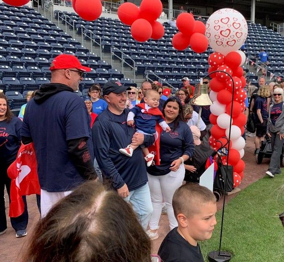 baby ringing the bell