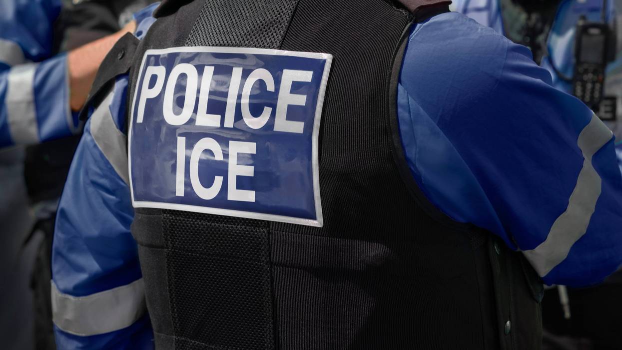 Back of an ICE agent's shirt