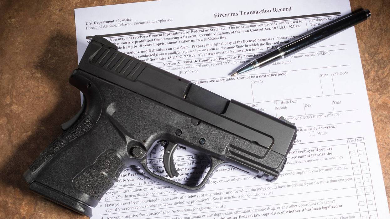 Background check for a gun purchase with a handgun