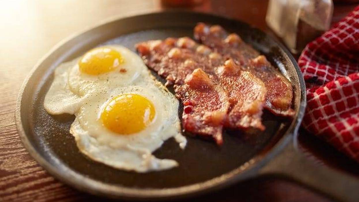 bacon and eggs in a skillet