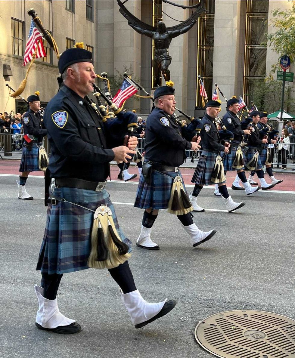 Bagpipers take part in the parade