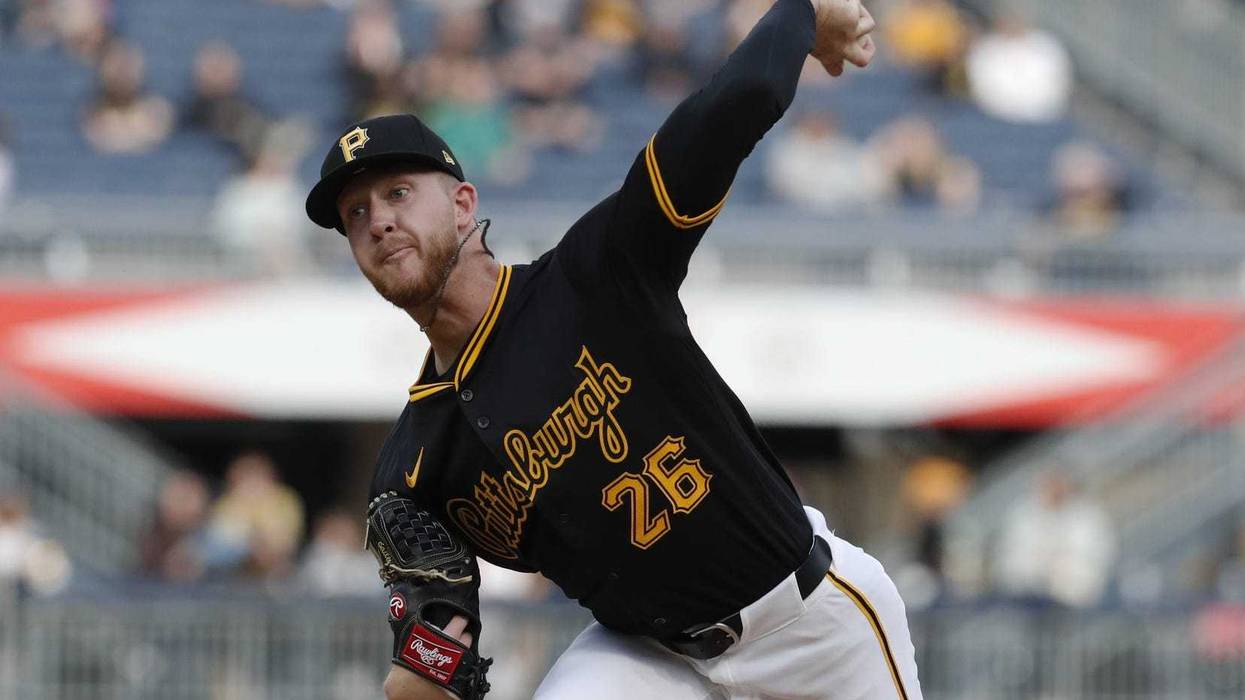 Bailey Falter throwing vs. Milwaukee at home