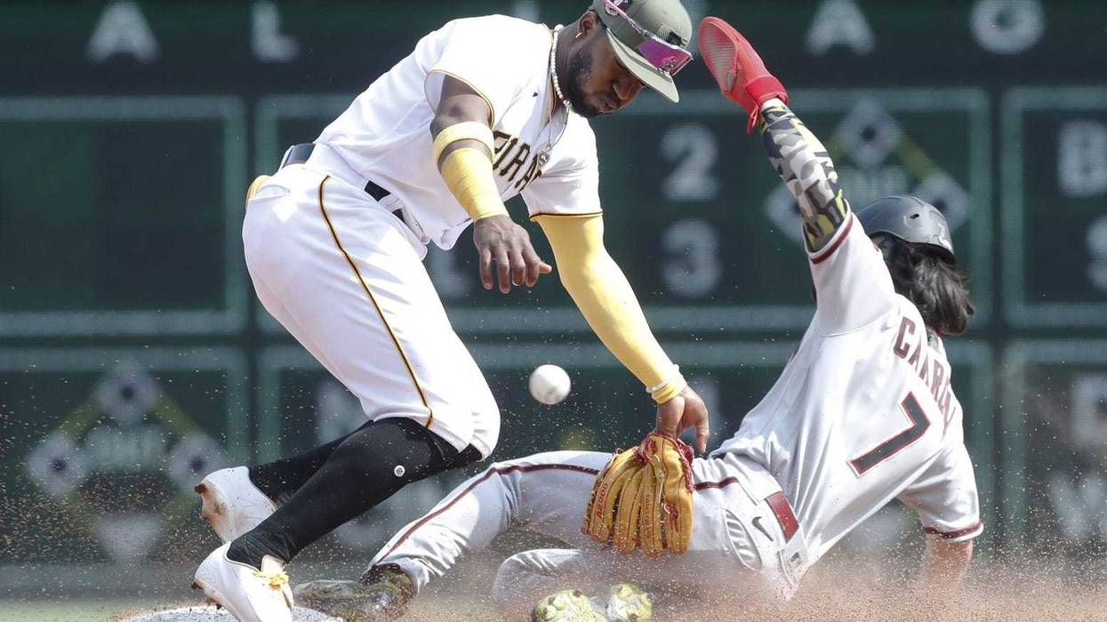 ball knocked away from Rodolfo Castro on Arizona slide