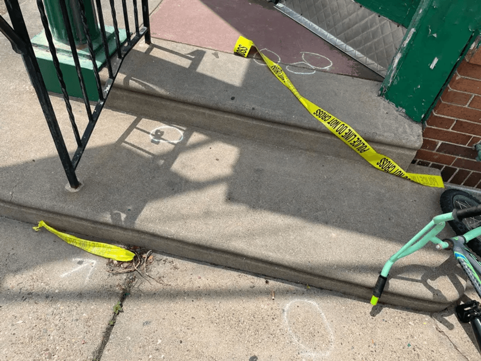 Ballistic evidence markers are still visible the morning after a gunman opened fire and killed five people, including a teenager, in Kingsessing in July 2023.