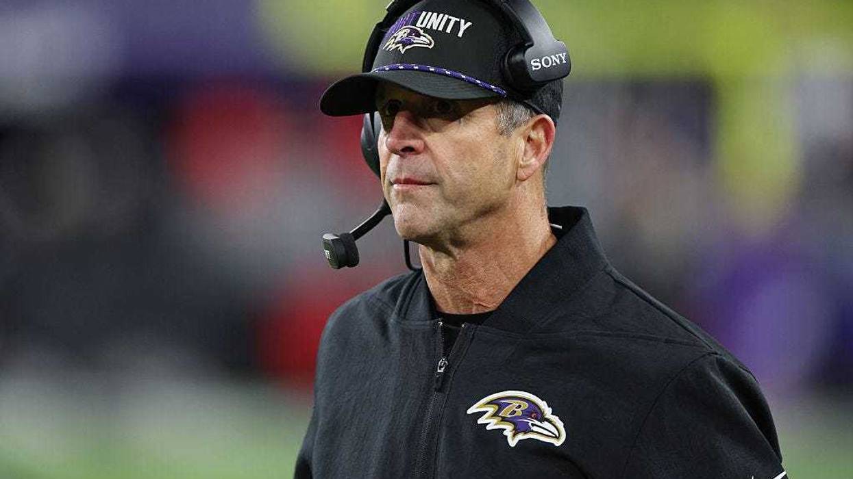 BALTIMORE, MARYLAND - DECEMBER 21: Head coach John Harbaugh of the Baltimore Ravens looks on during the fourth quarter against the New England Patriots at M&T Bank Stadium on December 21, 2025 in Baltimore, Maryland