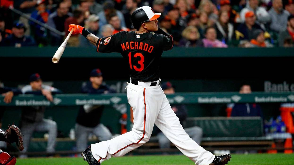 Baltimore Orioles' Manny Machado watches his solo home run in the fourth inning of a baseball game against the Cleveland Indians, Friday, April 20, 2018, in Baltimore.
