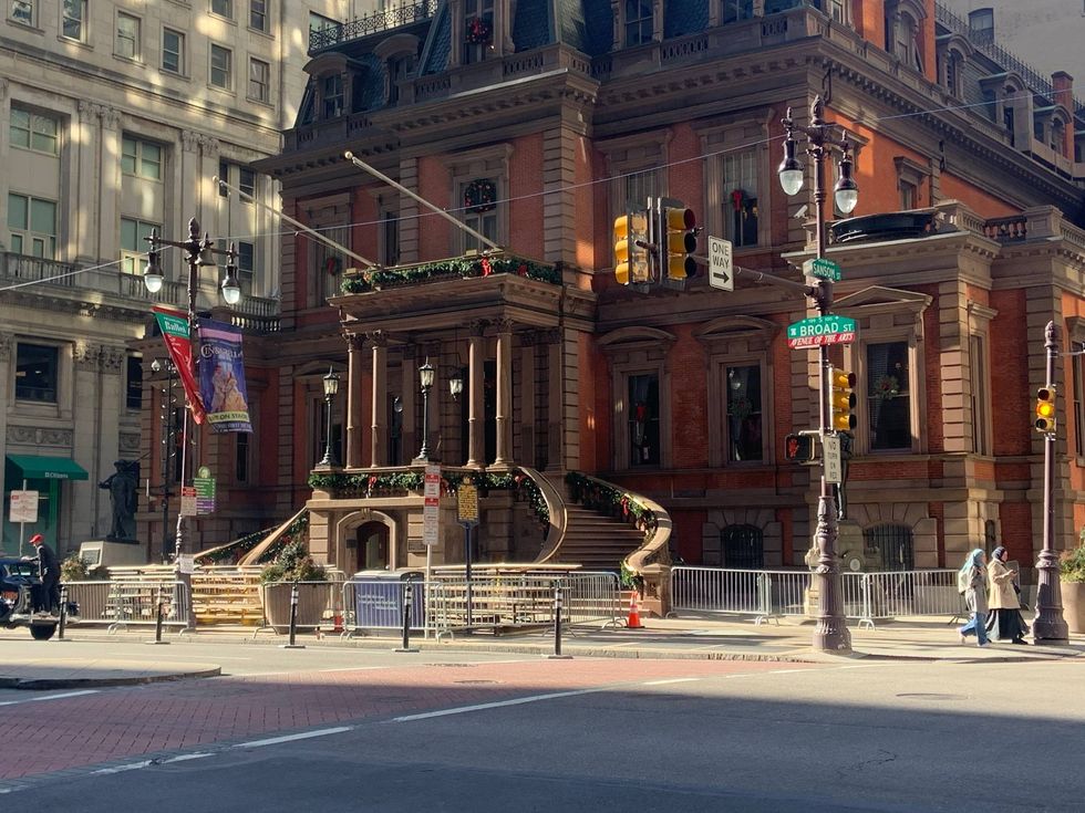 Barricades are set up along Broad Street where Mummers will perform on Sunday.