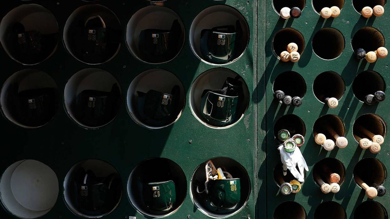 Baseball helmets and bats