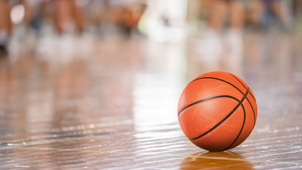 Basketball on court.