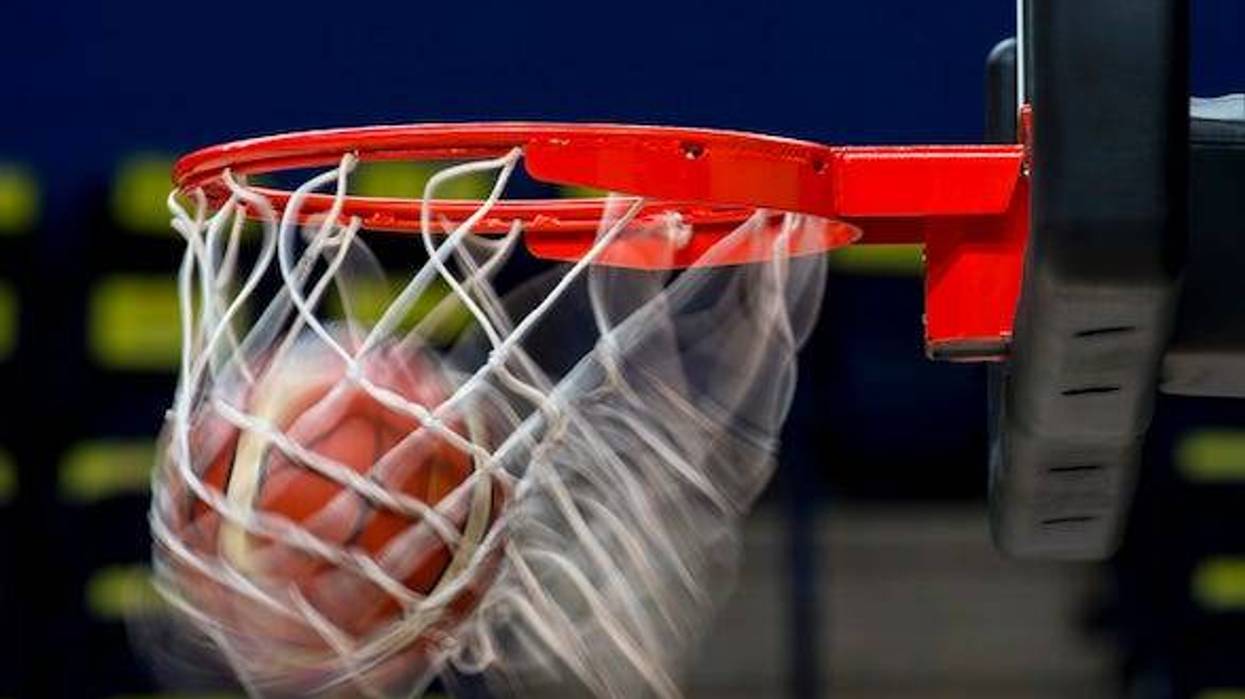 Basketball swishing through net